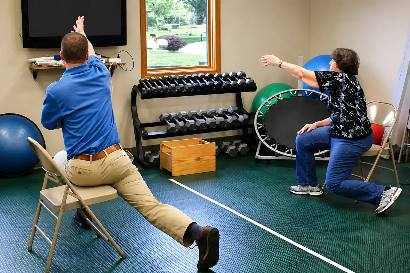 Therapist coaching large amplitude LSVT BIG movements in Abilene, KS