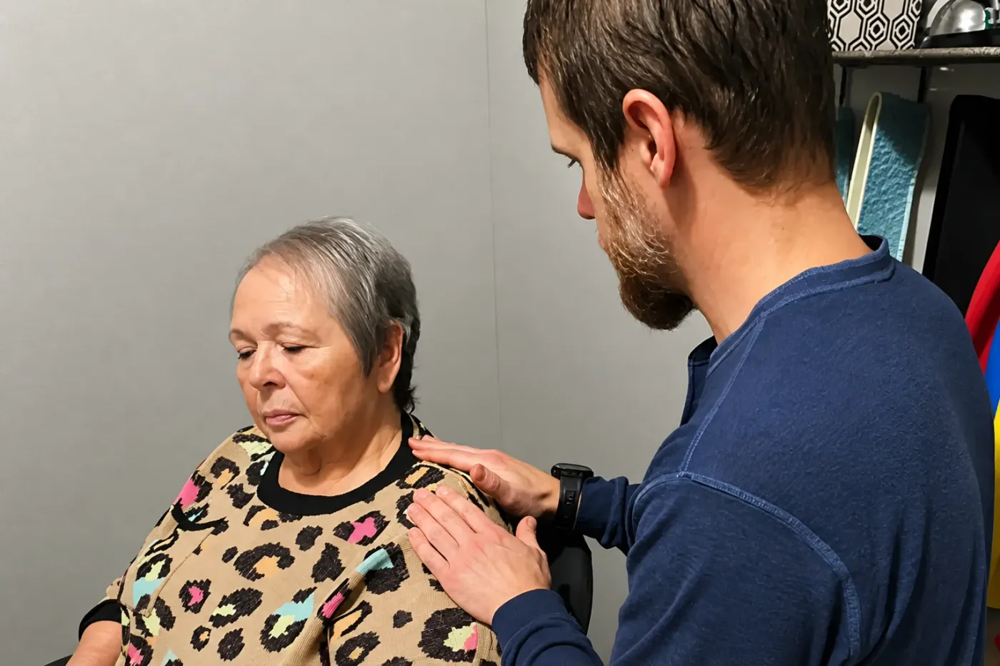 Physical therapist performing hands-on manual therapy treatment