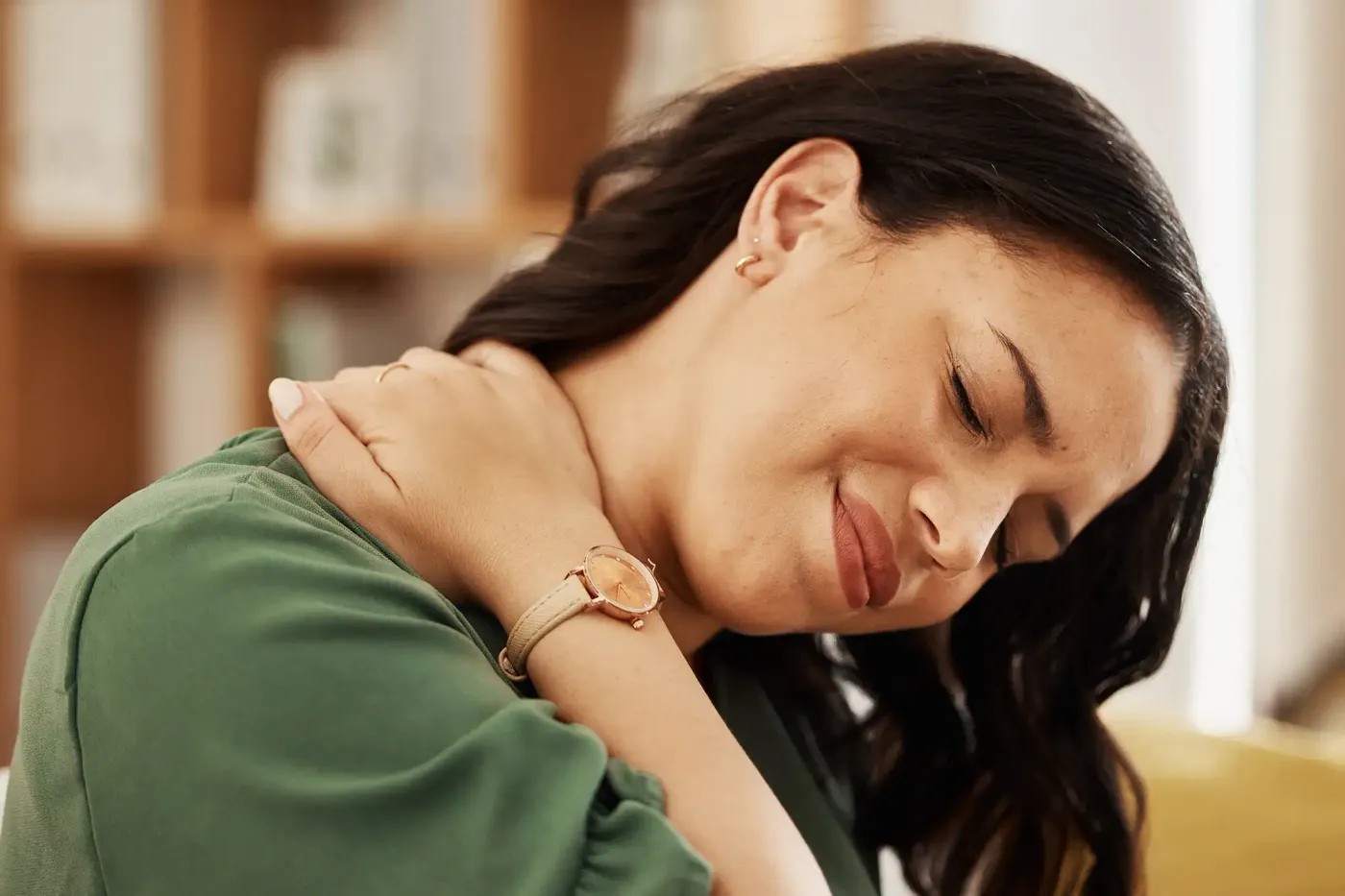 Therapist working with a patient on chronic pain management exercises