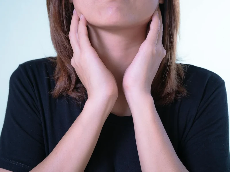 Physical therapist examining a patient's neck range of motion