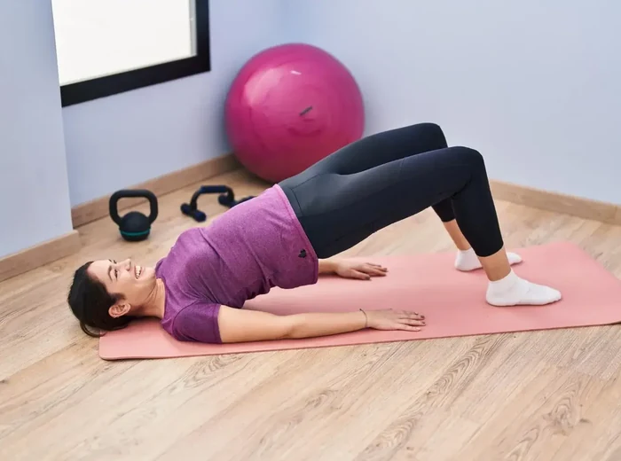 Therapist explaining pelvic floor therapy to a patient